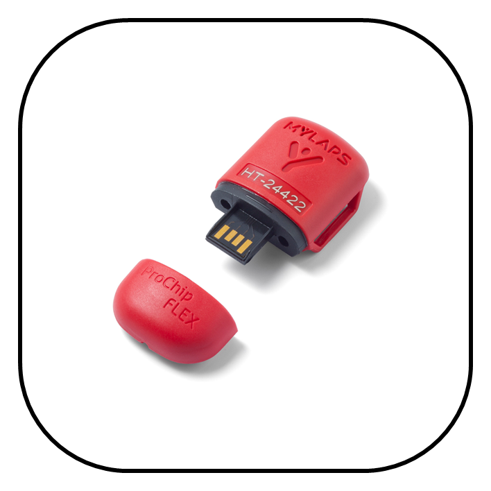 Picture of a Mylaps ProChip Flex in red lying down with the cap removed to show the USB-A connection